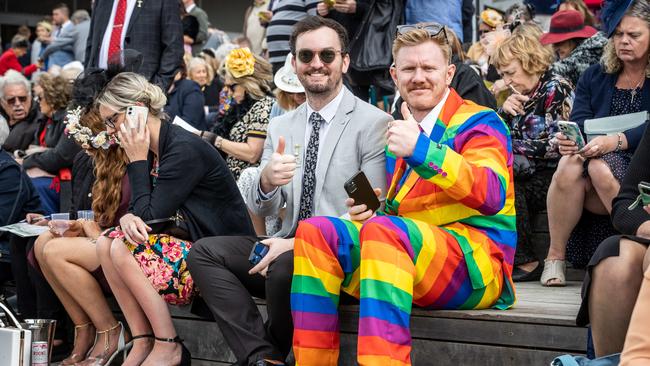 Nathan Henderson wears a rainbow suit at Melbourne Cup. 2022. Picture: Jake Nowakowski