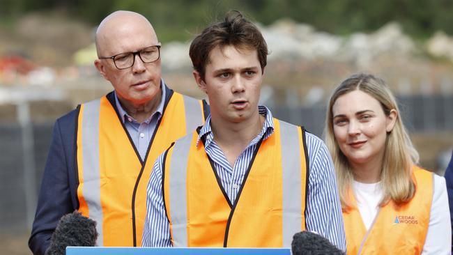 Mr Dutton, his son Harry Dutton and Liberal MP for Ryan Maggie Forrest, who visited a local housing construction site to talk about the Liberal housing policy. Picture: Richard Dobson / Newswire