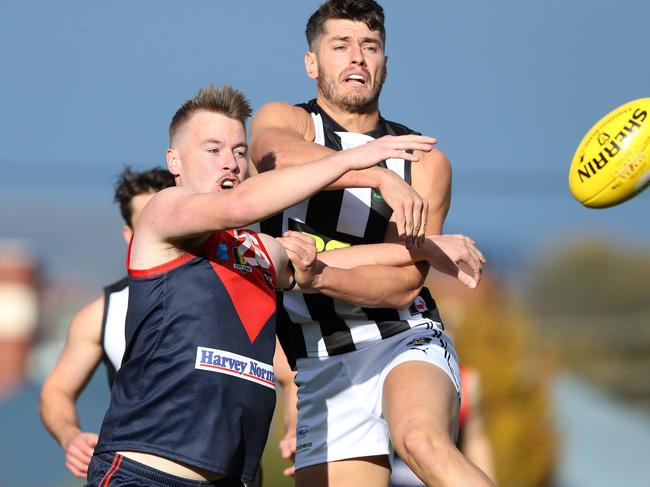 Glenorchy’s Tom Cleary, right, was one of the best on the ground before he was injured. Picture: Nikki Davis-Jones