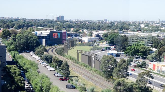 Artist image of what the twin tracks will look like near Baxter St in Mascot once the project is completed.