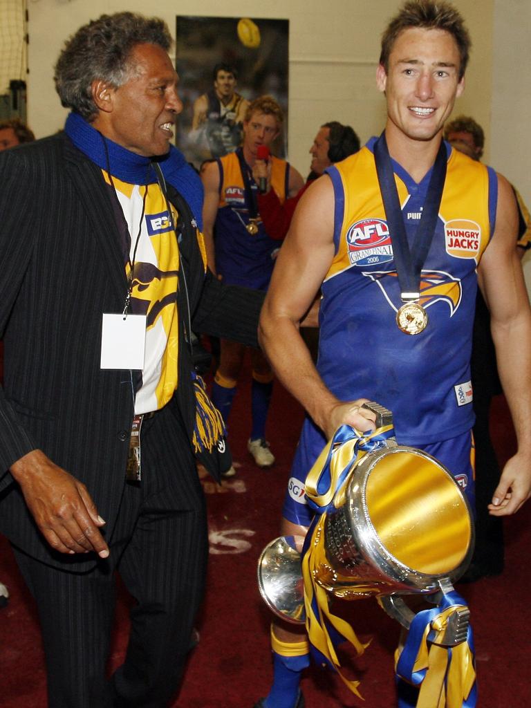 A pumped up Ernie Dingo with Adam Hunter after the Eagles won the 2006 grand final.