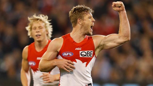 Luke Parker celebrates a goal against Geelong.