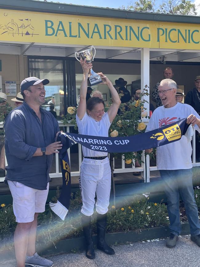 Marie-Melodie Pomarede hoists the Balnarring Cup.