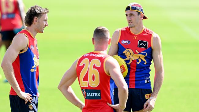 Harris Andrews, left, with Oscar McInerney and Conor McKenna at Brisbane training. Picture: Bradley Kanaris/Getty Images