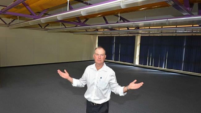 Tony Perrett standing in the unused Tafe building the USC is wanting to use. Picture: Renee Albrecht