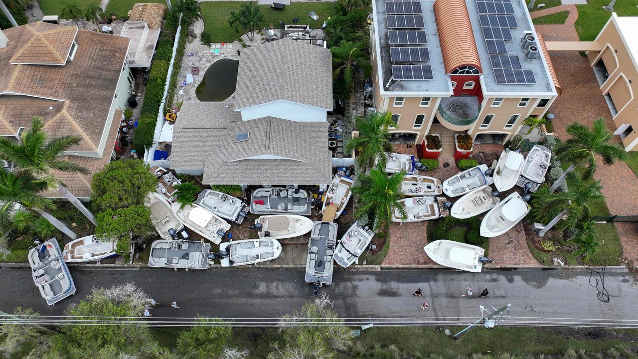 Boats are piled up outside damaged homes in Treasure Island, Florida. Picture: Joe Raedle/Getty Images/AFP