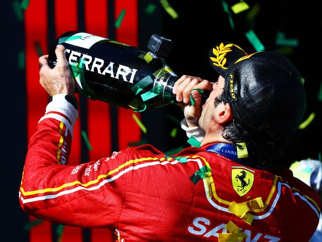 Race winner Carlos Sainz celebrates. (Photo by Mark Thompson/Getty Images)