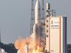 The Ariane 5 rocket launches from the Ariane Launch Area 3 at the European spaceport in Kourou, in French Guiana on September 30, 2015. The rocket successfully launched a pair of communications satellites, the ARSAT -2 satellite for Argentine operator ARSAT and the Muster Sky satellite for Australian operator NBN. AFP PHOTO/ JODY AMIET