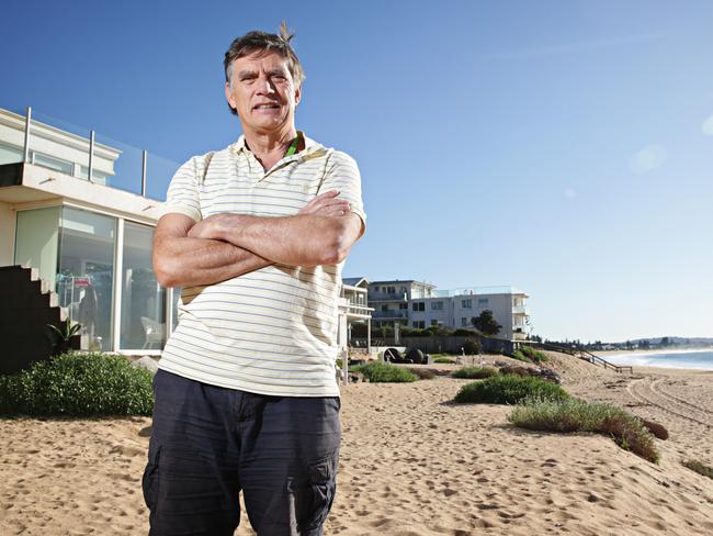 Garry Silk in front of his home a year after the historic storm. Picture: Adam Yip.