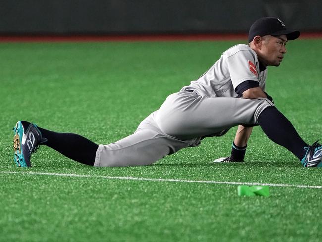 TOKYO, JAPAN - MARCH 18: Outfielder Ichiro Suzuki #51 of the Seattle Mariners stretches prior to the preseason friendly game between Yomiuri Giants and Seattle Mariners at Tokyo Dome on March 18, 2019 in Tokyo, Japan. (Photo by Masterpress/Getty Images)