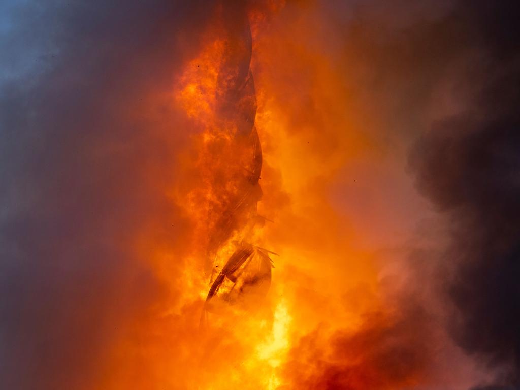 The tower of the historic Boersen stock exchange stands in flames in central Copenhagen, Denmark. Picture: Ritzau Scanpix / AFP