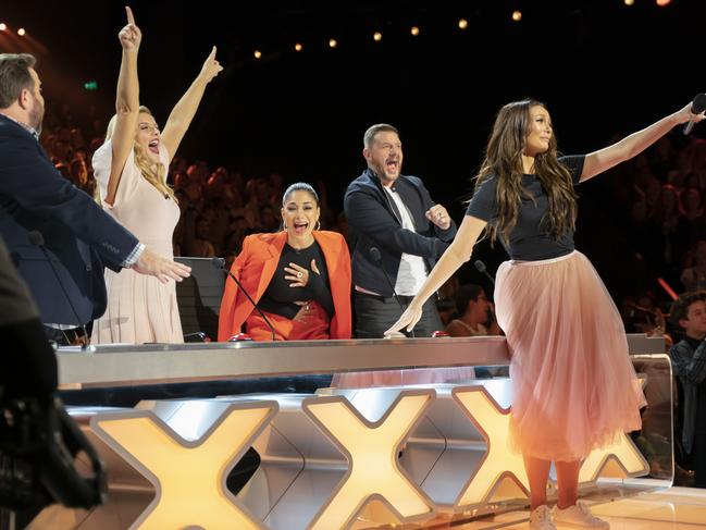 Australia's Got Talent host Ricki-Lee Coulter uses the golden buzzer. Pictured with judges, from left, Shane Jacobson, Lucy Durack, Nicole Scherzinger and Manu Feildel. Picture: Supplied