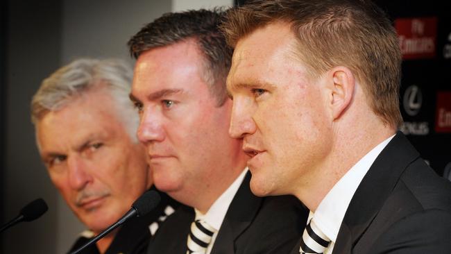 28/07/2009 NEWS: Collingwood President Eddie McGuire (centre) announced that Mick Malthouse will stay on as coach until 2011 and Nathan Buckley (right) will be assistant coach assuming the roll of coach when Malthouse takes the newly created job of Coaching Director. Pic. Craig Borrow