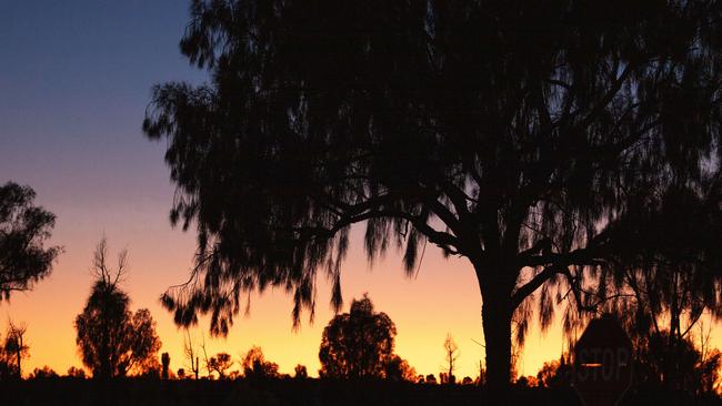 Early morning glow in the outskirts of Yulara. Picture: Nico Liengme