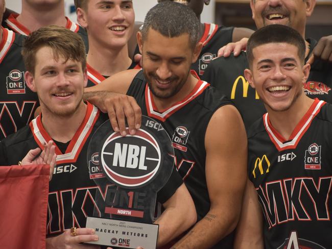 Former Ansett star Freddy Webb (right) pictured celebrating with his Mackay teammates after the Meteors beat Cairns 2-0 in the 2021 NBL1 North Grand Final Series. Picture: Matthew Forrest