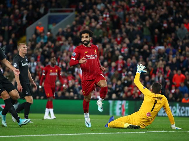 LIVERPOOL, ENGLAND - OCTOBER 02: Mohamed Salah of Liverpool celebrates after he scores his sides fourth goal during the UEFA Champions League group E match between Liverpool FC and RB Salzburg at Anfield on October 02, 2019 in Liverpool, United Kingdom. (Photo by Clive Brunskill/Getty Images)