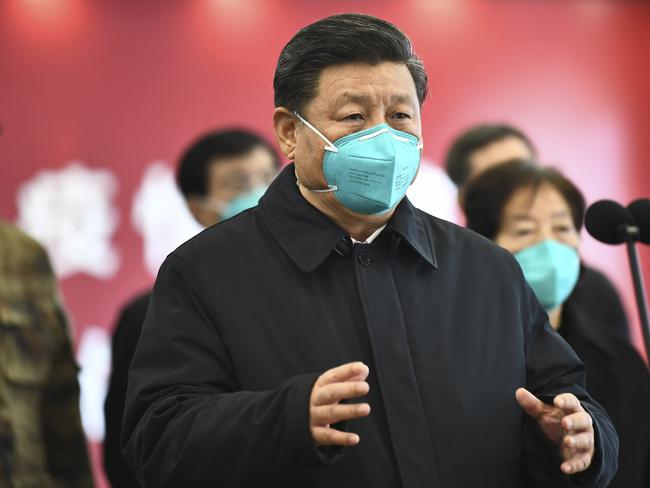 In this Tuesday, March 10, 2020, photo released by China's Xinhua News Agency, Chinese President Xi Jinping talks by video with patients and medical workers at the Huoshenshan Hospital in Wuhan in central China's Hubei Province. Top Chinese officials secretly determined they were likely facing a pandemic from a novel coronavirus in mid-January, ordering preparations even as they downplayed it in public. Internal documents obtained by the AP show that because warnings were muffled inside China, it took a confirmed case in Thailand to jolt Beijing into recognizing the possible pandemic before them. (Xie Huanchi/Xinhua via AP)