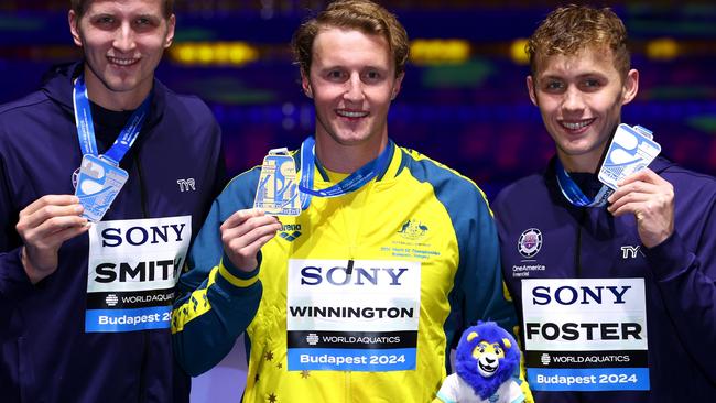 BUDAPEST, HUNGARY - DECEMBER 12:  Mens 400m Freestyle medalists Kieran Smith, Elijah Winnington and Carson Foster during day three of the World Aquatics Swimming Championships (25m) 2024 at Duna Arena on December 12, 2024 in Budapest, Hungary. (Photo by Dean Mouhtaropoulos/Getty Images)