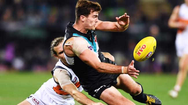 Scott Lycett of Port Adelaide competes with Giants co-captain Phil Davis in Round 19. Picture: Mark Brake/Getty Images