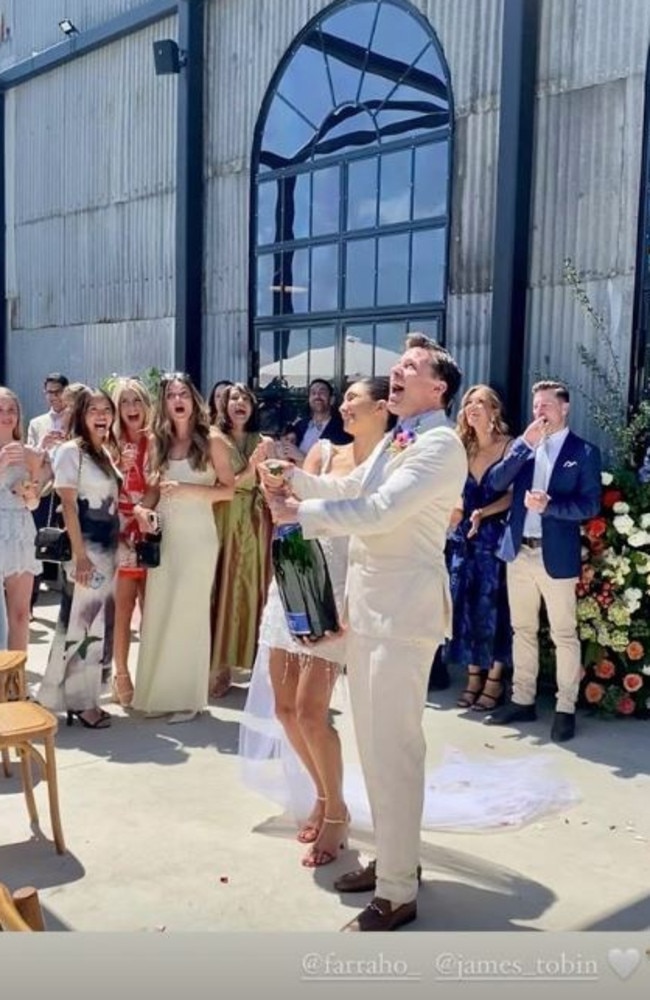 The couple kick off the reception by popping bottles. Picture: Instagram