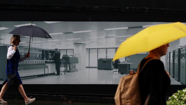 Pedestrians pass the Reserve Bank of Australia (RBA) building in Sydney, Australia. Picture: Lisa Maree Williams/Bloomberg