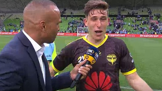 Wellington Phoenix’s Louis Fenton swears during a post-match interview with Archie Thompson.