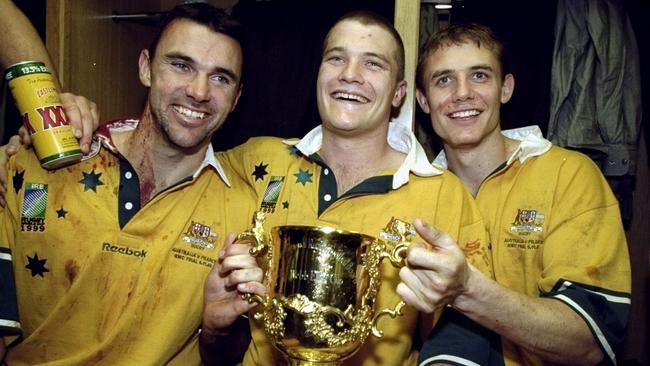 Joe Roff, Ben Tune and Stephen Larkham, pictured in 1999, all made Wayne Smith’s Wallabies team of the last half-century. Picture: Dave Rogers