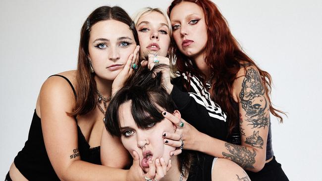 Canberra rock band Teen Jesus and the Jean Teasers, whose debut album 'I Love You' was released on October 6, 2023. Clockwise from top left: Neve van Boxsel, Jaida Stephenson, Scarlett McKahey and Anna Ryan (bottom). Picture: Michelle Pitiris / She Is Aphrodite