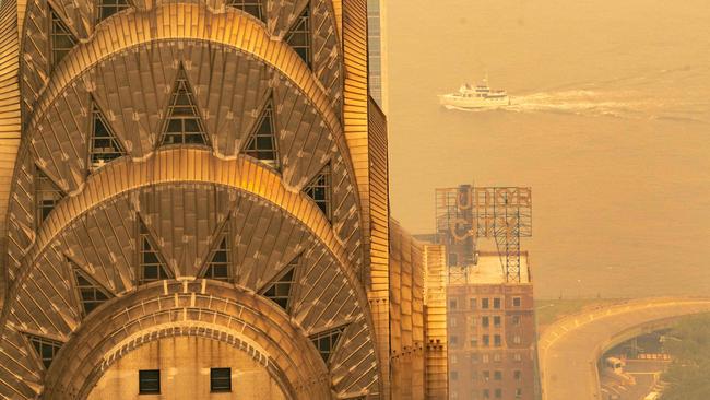 The Chrysler Building is blanketed in a yellowish haze. Picture: Getty Images