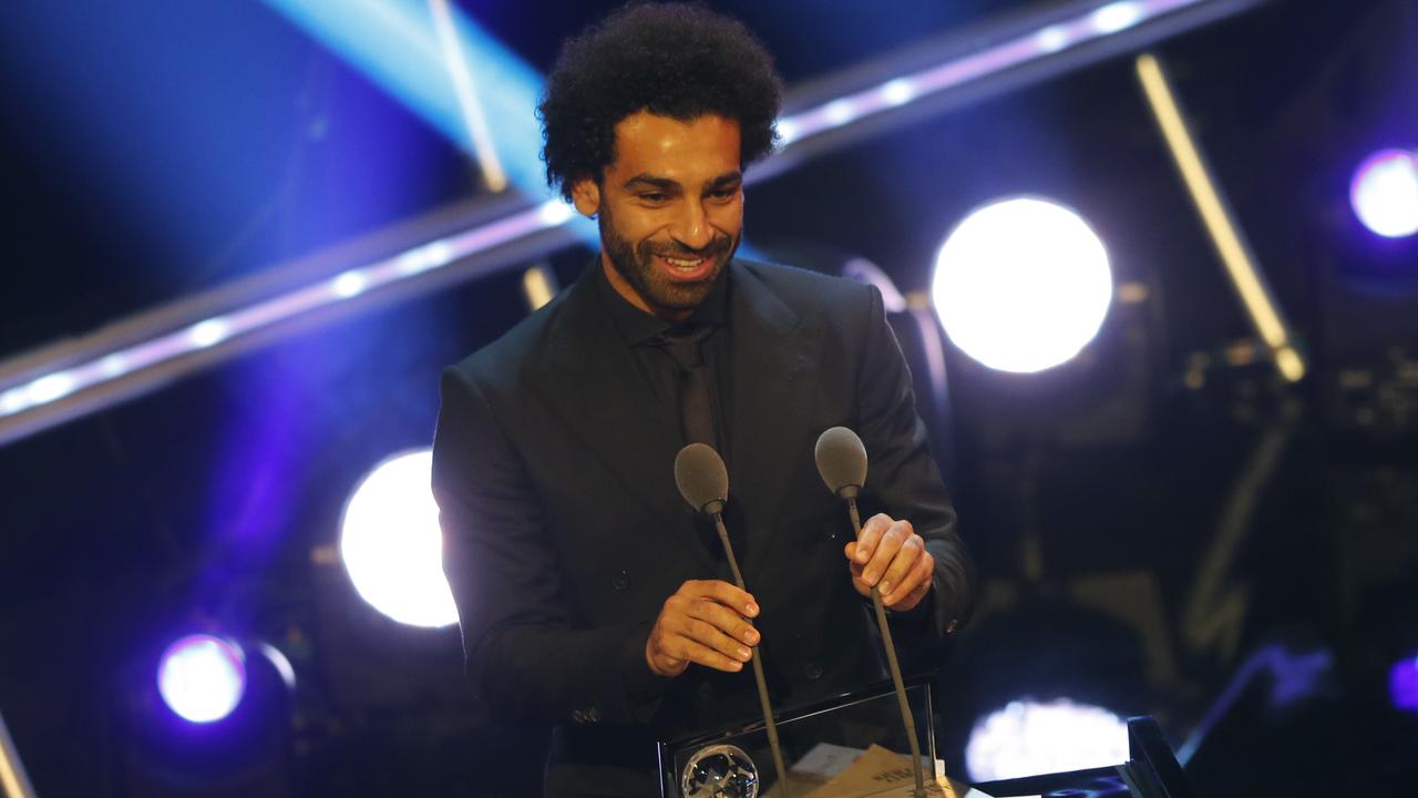 Egypt's soccer star Mohamed Salah receives the FIFA Puskas award