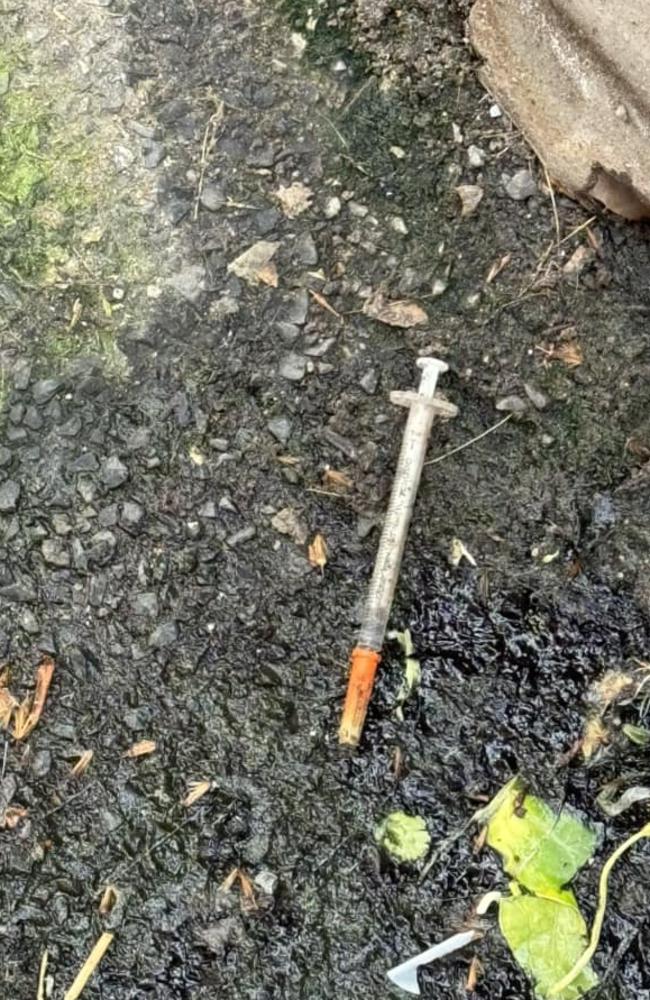 Needles are commonly found strewn on the ground in the area surrounding the injecting room. Picture: Facebook