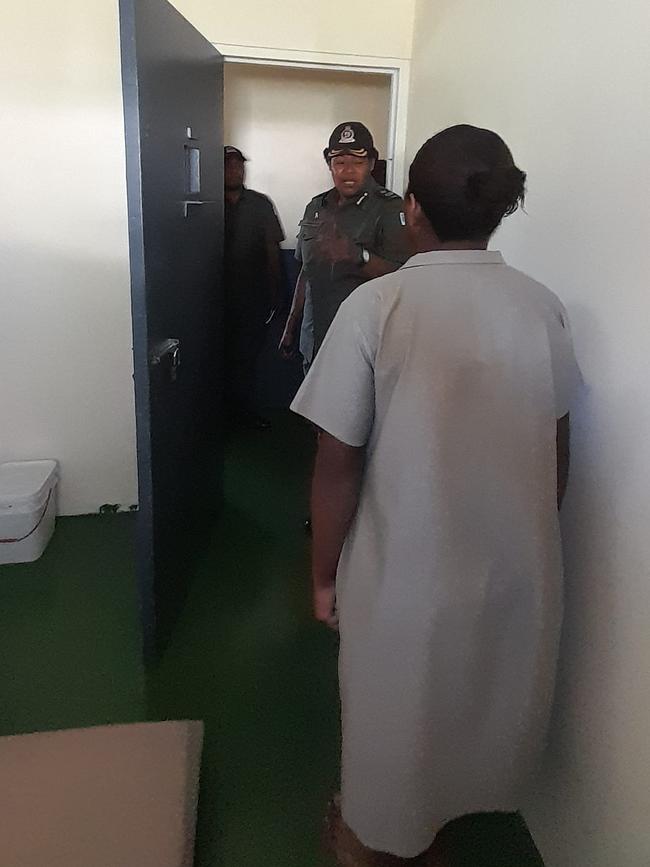 A thin mattress on the floor and a bucket in a Fiji female prisoner's cell