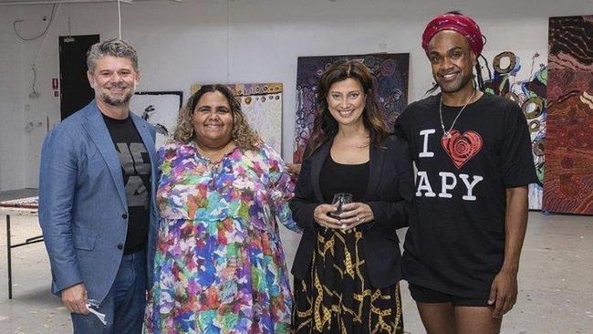 NGA director Nick Mitzevich, APY Lands artist Sally Scales, South Australian Arts Minister Andrea Michaels and Wynne Prize winner Zaacariah Fielding at the APY ACC’s studio in Adelaide earlier this year.