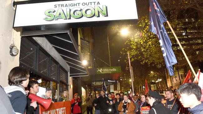 Dozens of angry hospitality workers outside Straight Outta Saigon. Picture: Tony Gough