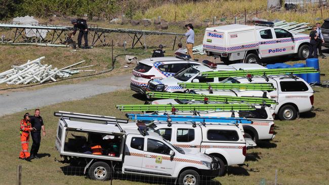 SES, Police and cadaver dogs at the property on Monday. Picture: Glenn Hampson