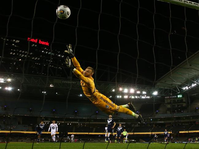 MELBOURNE, AUSTRALIA - APRIL 23: Victory goalkeeper Matt Acton is beaten by a shot from Nicolai Muller of the Wanderers during the A-League match between the Melbourne Victory and the Western Sydney Wanderers at Marvel Stadium, on April 23, 2021, in Melbourne, Australia. (Photo by Robert Cianflone/Getty Images) *** BESTPIX ***