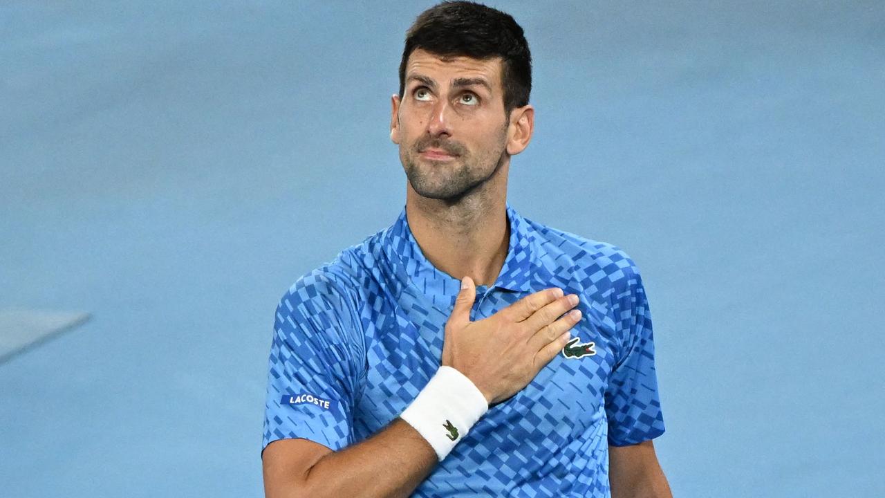 Serbia's Novak Djokovic celebrates his win. Photo by WILLIAM WEST / AFP.