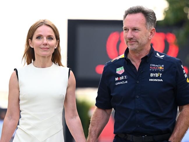 BAHRAIN, BAHRAIN - MARCH 02: Oracle Red Bull Racing Team Principal Christian Horner and Geri Horner walk in the Paddock holding hands prior to the F1 Grand Prix of Bahrain at Bahrain International Circuit on March 02, 2024 in Bahrain, Bahrain. (Photo by Clive Mason/Getty Images)