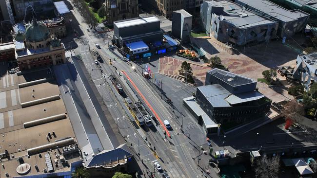 6/08/20 Aerial pics of empty roads in Melbourne as strict stage 4 lockdowns are enforced. Swanston Street and Federation square. Aaron Francis/The Australian