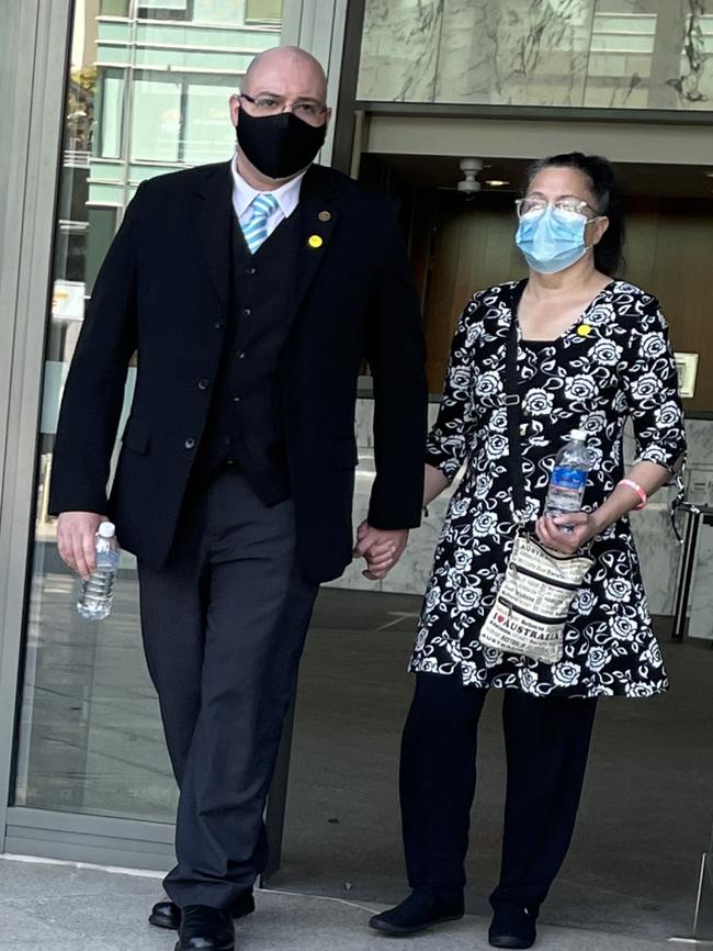 Christopher Barnes leaves Parramatta District Court with his mother at the start of his trial.