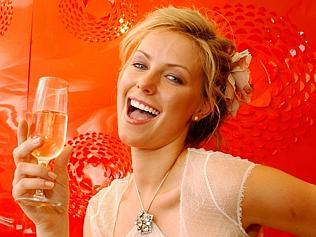 30 Oct 2004 Derby Day Fashion at Flemington - Miss Universe, Jennifer Hawkins - headshot profile glass white wine?