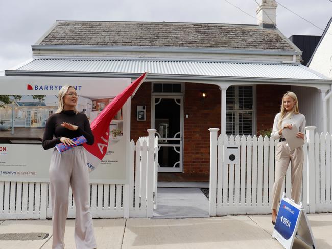 Auctioneer Julia Warren, left, calls for bids at 10 McNicol St, Geelong West.