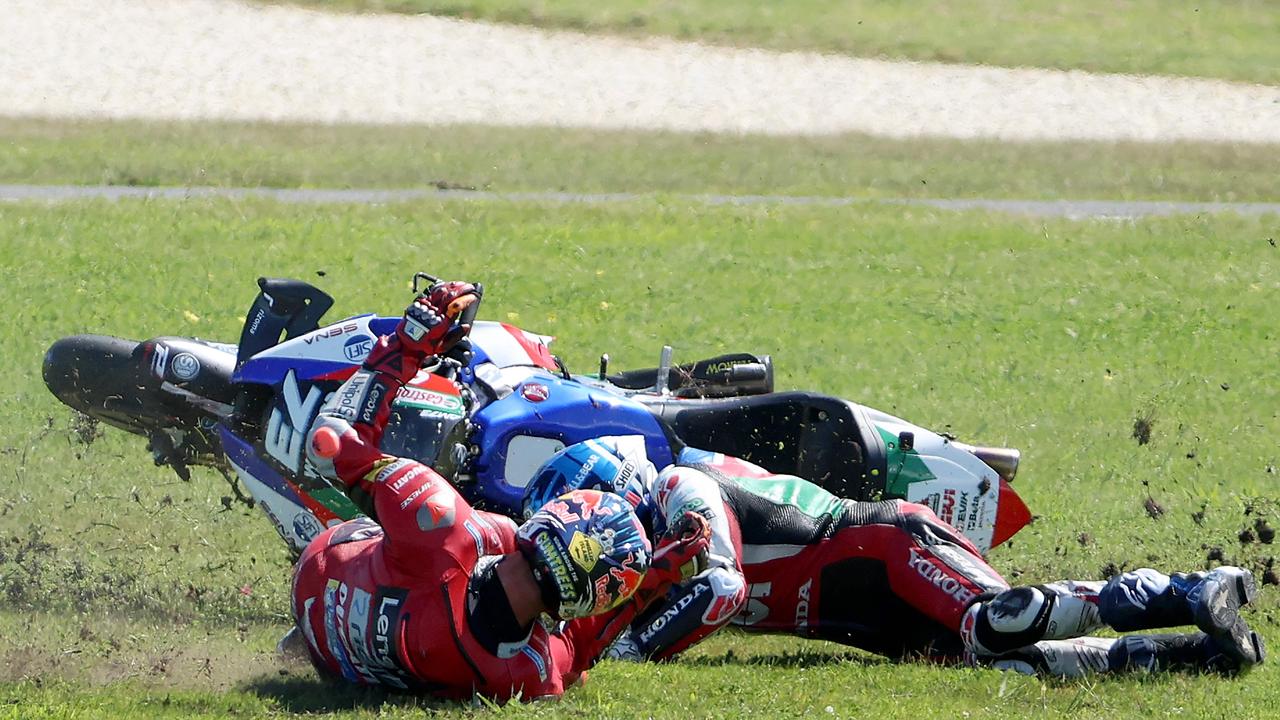 Miller taken out of MotoGP. (Photo by Glenn Nicholls / AFP)