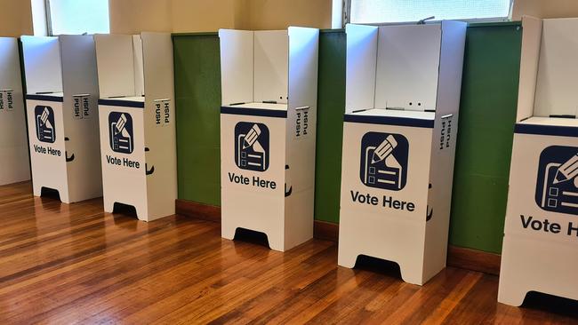 A row of voting booths. Does the sight not excite you?