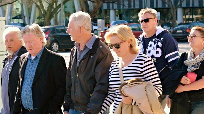 David Lawrence’s siblings and their partners outside court. Picture: Roy Vandervegt