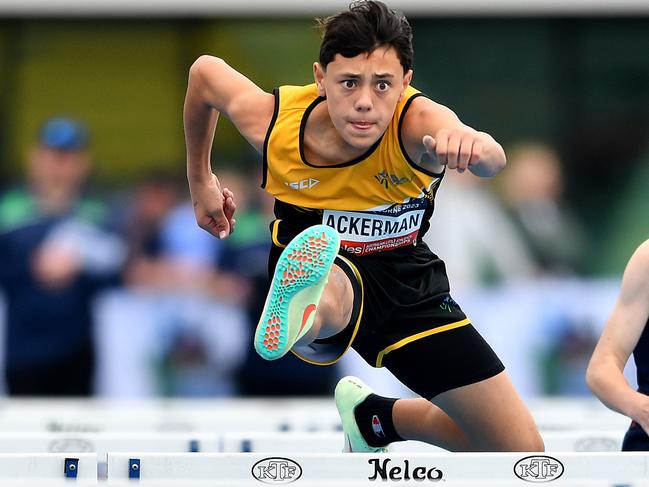 Davin Yap (NSW), Travarn Ackerman (WA) and Hugo Gwynne (SA) compete in the Boys U13 80m Hurdles during the Australian Little Athletics Championships at Lakeside Stadium in Albert Park, Victoria on April 23, 2023.