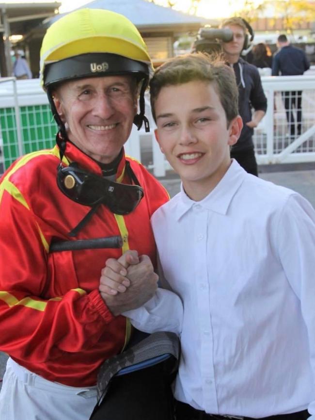 A young Zac Lloyd with his jockey father Jeff. Picture: Supplied