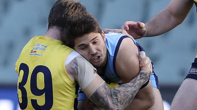 James Battersby runs into Eagle Jack Firns during Sunday’s qualifying final and hurting his AC joint. Picture Sarah Reed