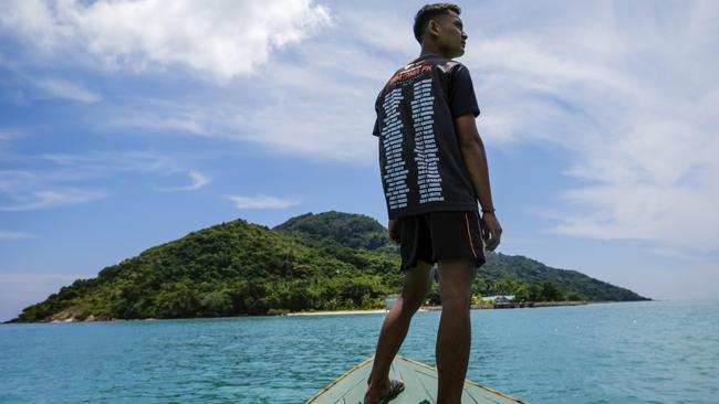 A boat approaches a military post on Sekatung Island. Picture: Jiro Ose