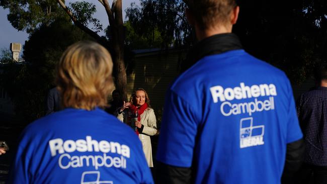 Candidate for Aston, Mary Doyle is seen handing out how to vote cards at Wantirna South Primary School. Picture: NCA NewsWire / Luis Ascui